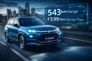 Maruti e Vitara in Celestial Blue driving on urban highway highlighting 543km range and ₹3.99 per km battery rental plan