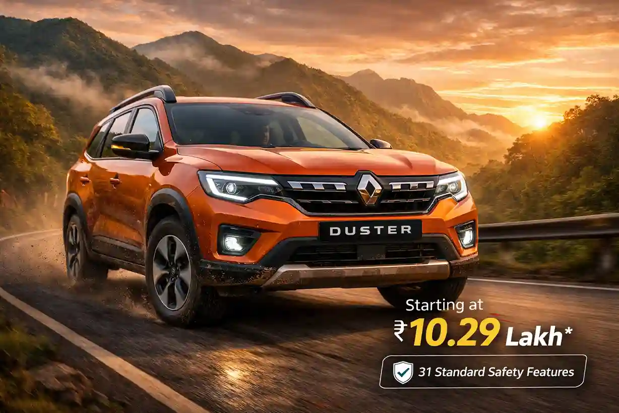 3rd generation Renault Duster SUV driving on mountain road with hybrid engine and 31 safety features starting at ₹10.29 lakh